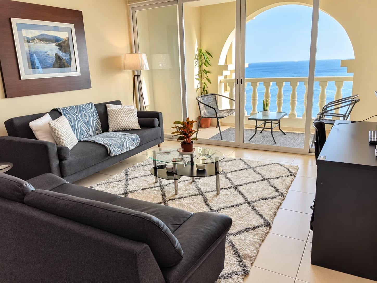 A furnished apartment can combine a balcony, water views and building amenities. The exact building, unit and lease terms still determine the real monthly cost.
